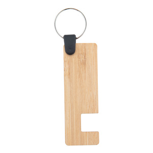 Fotografie k reklamnímu předmětu „stojánek na mobil s přívěškem na klíče“